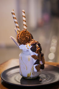 Chocolate cream freak shake in black plate