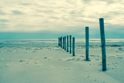 Scenic view of beach against sky