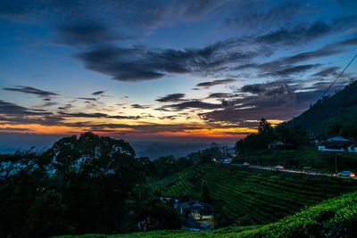 Scenic view of landscape against sky during sunset