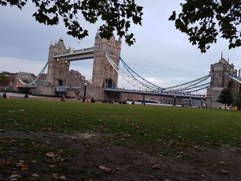 View of bridge against cloudy sky