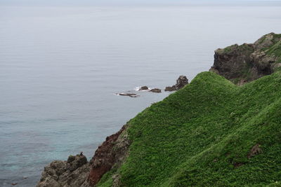 Scenic view of sea and rock