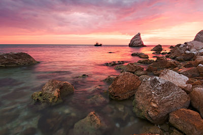 Scenic view of sea against sky during sunset