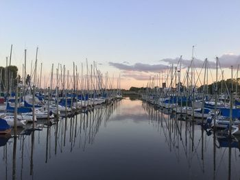 Boats moored at harbor