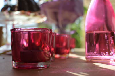 Close-up of red wine in glass on table