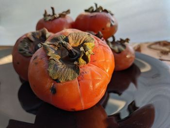 Close-up of orange fruits on table