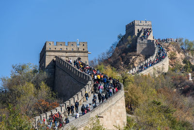 Group of people in front of historical building