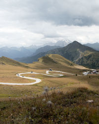 Scenic view of landscape and mountains against sky