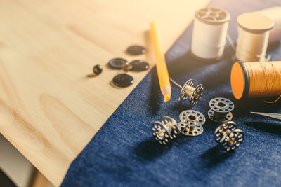 High angle view of buttons on table