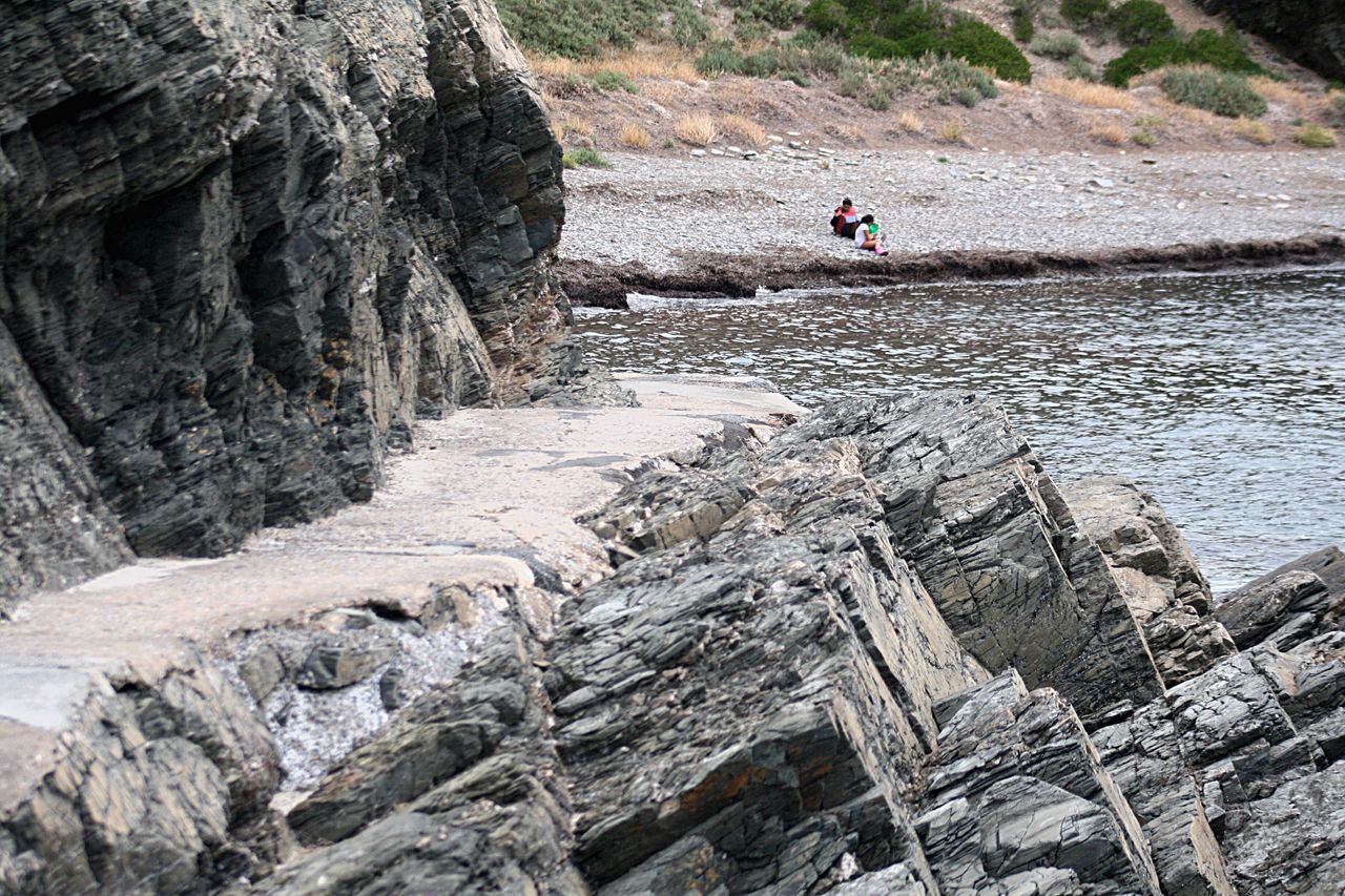 Woman and child on beach