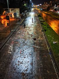 Wet road in city during rainy season