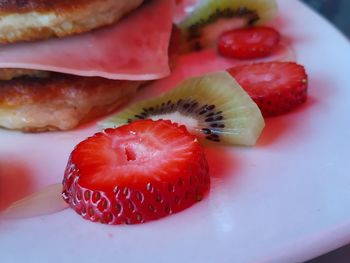 Close-up of fruits in plate on table