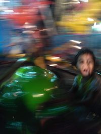 Portrait of a boy in amusement park