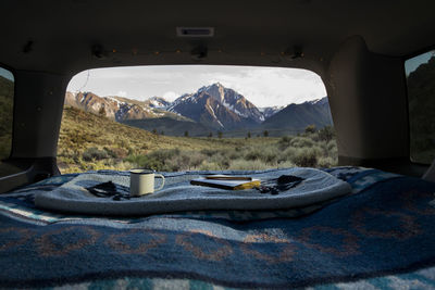 High angle view of ice cream on table in mountains