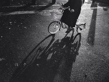 Person riding bicycle on road