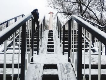 Low angle view of building against sky during winter