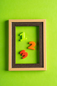 High angle view of stuffed toy on green surface