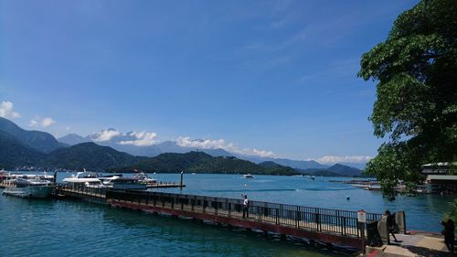 Scenic view of sea against blue sky