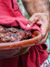 Close-up of man preparing food