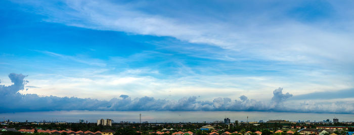 Scenic view of cityscape against sky