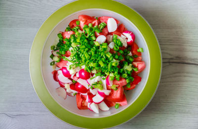 High angle view of salad in bowl on table