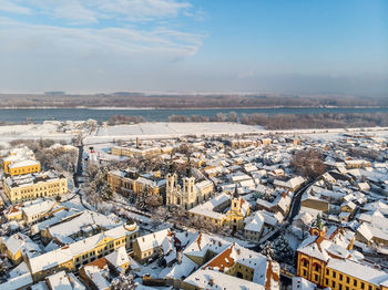 High angle view of buildings in city against sky