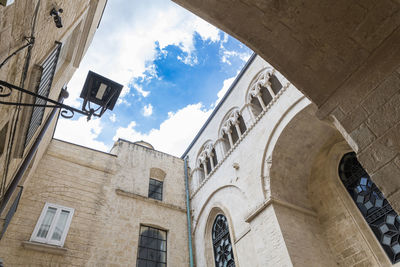 Low angle view of old building against sky