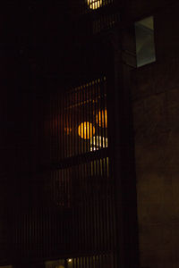 Low angle view of illuminated window in building