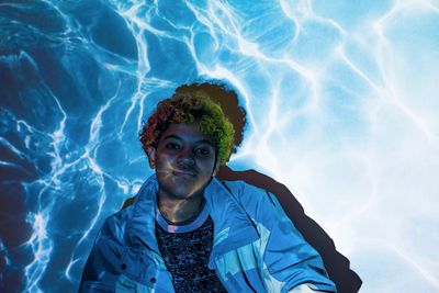 Portrait of mid adult man in swimming pool