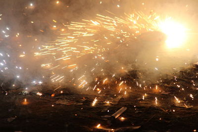 Firework display at night