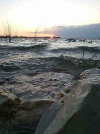 Scenic view of sea against sky during sunset