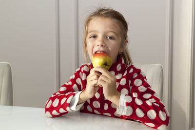 Portrait of a girl eating food