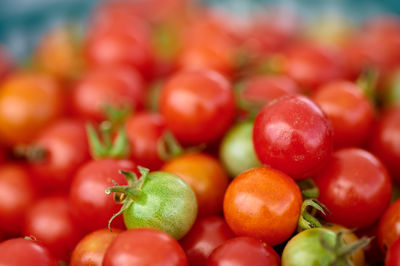 Close-up of red tomatoes for sale at market stall