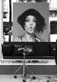 Portrait of woman sitting on table