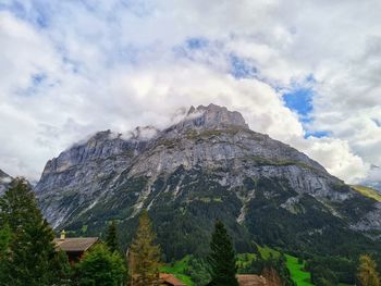 Low angle view of mountain range against sky