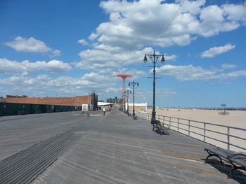 View of road against cloudy sky