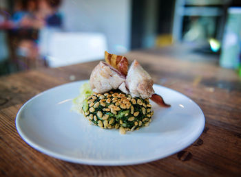 Close-up of food in plate on table