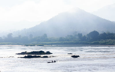 Scenic view of river against sky