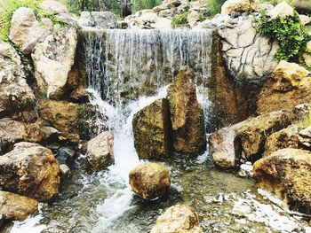 Scenic view of waterfall in forest