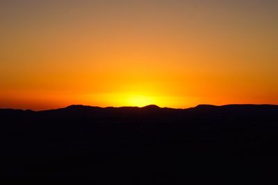 Scenic view of mountains at sunset