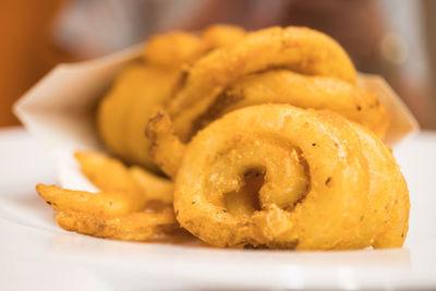 Close-up of serving food in plate