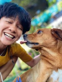 Portrait of cute boy with dog