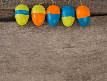 High angle view of multi colored easter eggs on table