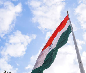 India flag flying high at connaught place with pride in blue sky, india flag fluttering, indian flag