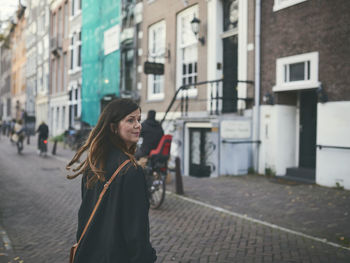 Woman walking in city