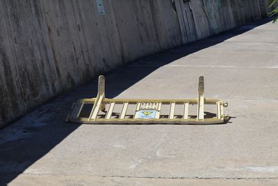 High angle view of fallen barricade on footpath