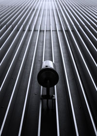 Low angle view of lighting equipment on wall