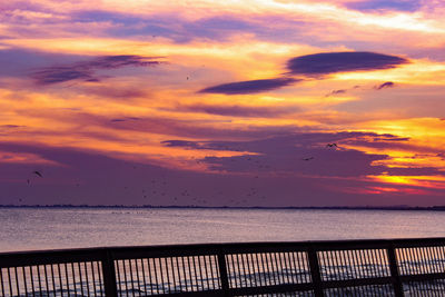 View of calm sea at sunset