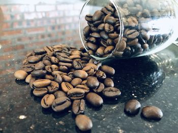 Close-up of coffee beans on table