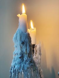 Close-up of burning candle