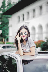 Young woman in car